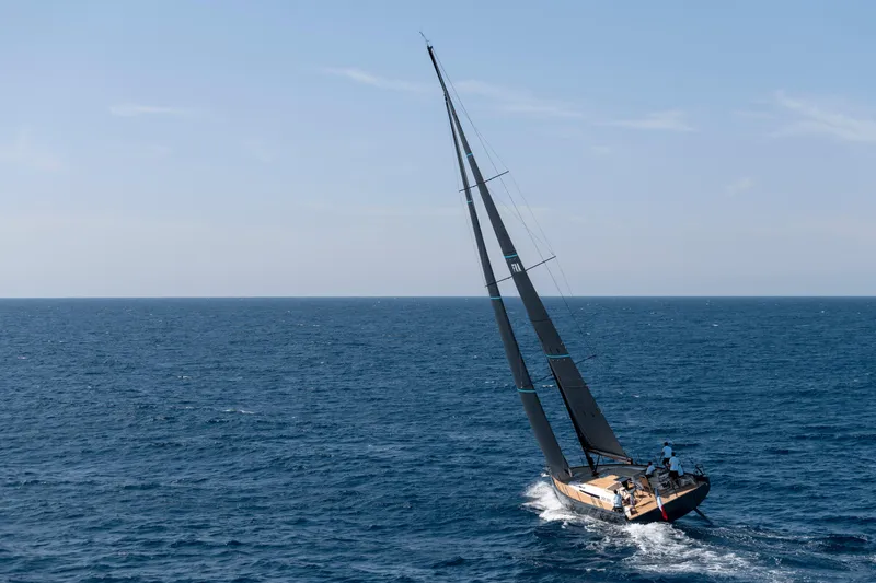 Slide: The Image of Sailing yacht Beneteau First 53, 2026 model, navigating open sea under clear skies. - 48