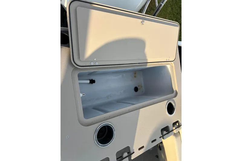 Slide: The Image of Open storage compartment on 2015 Sylvan Mirage Fish 8522 Party Fish LE boat. - 20