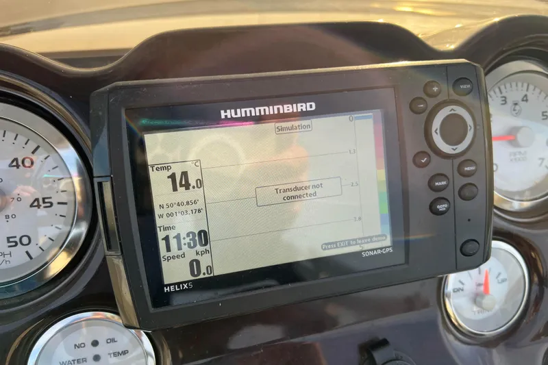 Slide: The Image of Humminbird sonar GPS display on 2015 Sylvan Mirage Fish 8522 dashboard, showing temperature and speed. - 27