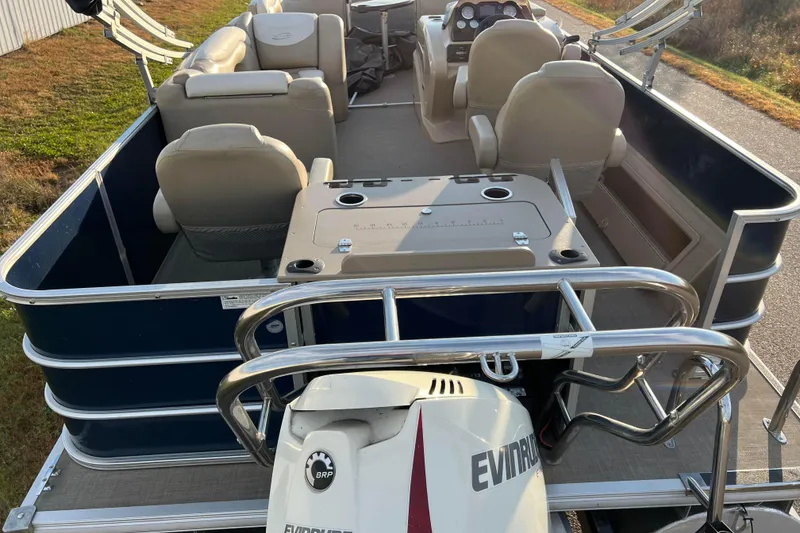 Slide: The Image of 2015 Sylvan Mirage Fish 8522 Party Fish LE pontoon boat interior with seating and control panel. - 3