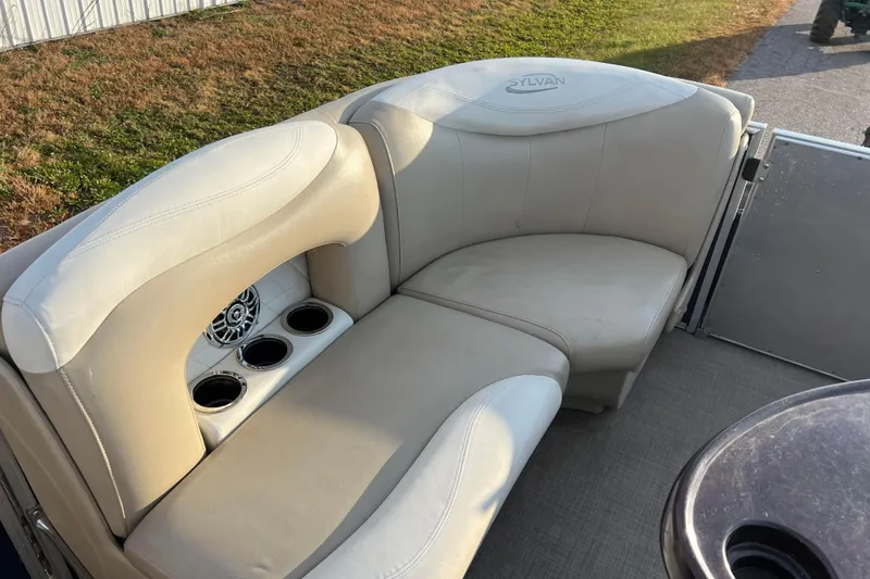 Slide: The Image of 2015 Sylvan Mirage Fish 8522 Party Fish LE boat seating with cup holders and speaker. - 31