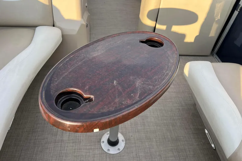 Slide: The Image of 2015 Sylvan Mirage Fish 8522 Party Fish LE boat table with cup holders. - 36