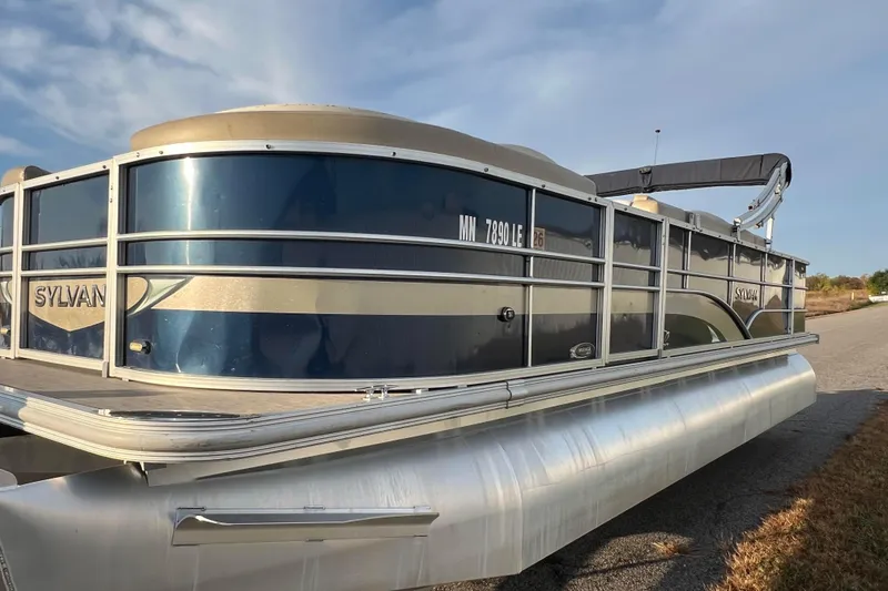 Slide: The Image of 2015 Sylvan Mirage Fish 8522 Party Fish LE pontoon boat on a sunny day. - 7