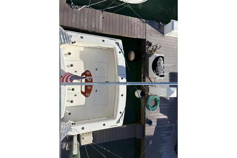 Slide: The Image of Overhead view of 2006 Topaz Express Cruiser docked at marina. - 15
