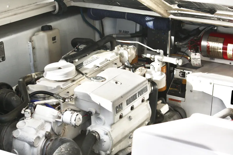 Slide: The Image of Engine room of 2006 Topaz Express Cruiser with CAT Marine Power engine. - 19