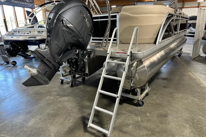 Slide: The Image of 2026 Godfrey SWEETWATER 2286 SB pontoon boat with Yamaha outboard motor in showroom. - 6