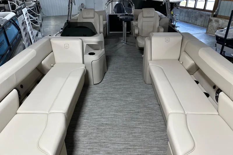 Slide: The Image of 2026 Godfrey SWEETWATER 2286 SB pontoon boat interior with beige seating and modern design. - 8