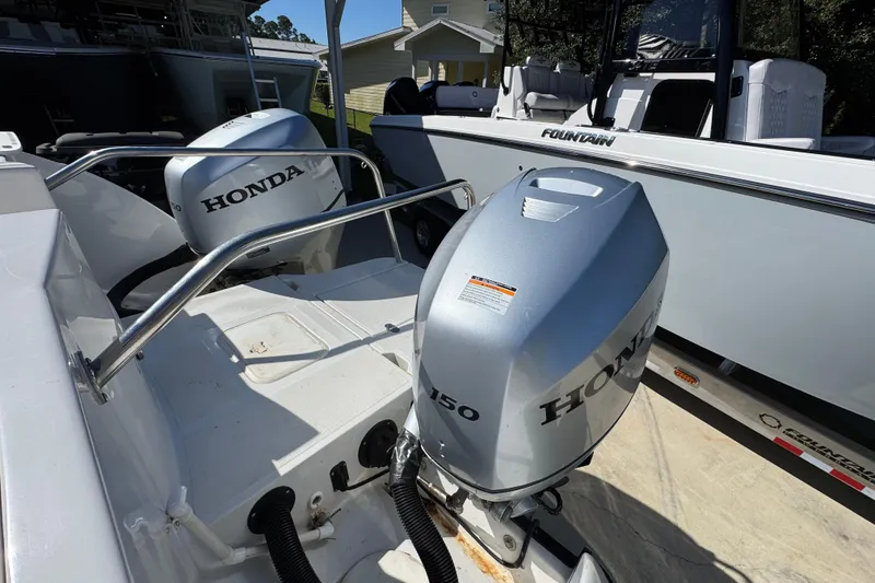 Slide: The Image of 2005 Glacier Bay 260 Canyon Runner with dual Honda 150 outboard motors. - 37