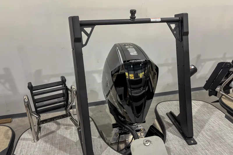 Slide: The Image of Alera M23L 2026 model with Mercury outboard motor in showroom display. - 11