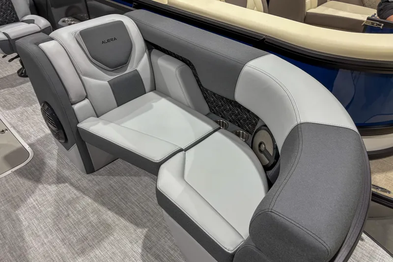 Slide: The Image of Luxurious seating on 2026 Alera M23L boat, featuring sleek gray upholstery and modern design. - 2