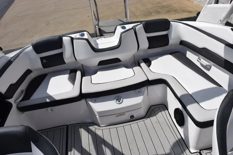 Slide: The Image of 2026 Yamaha Boats 195S interior with sleek white and black seating. - 10