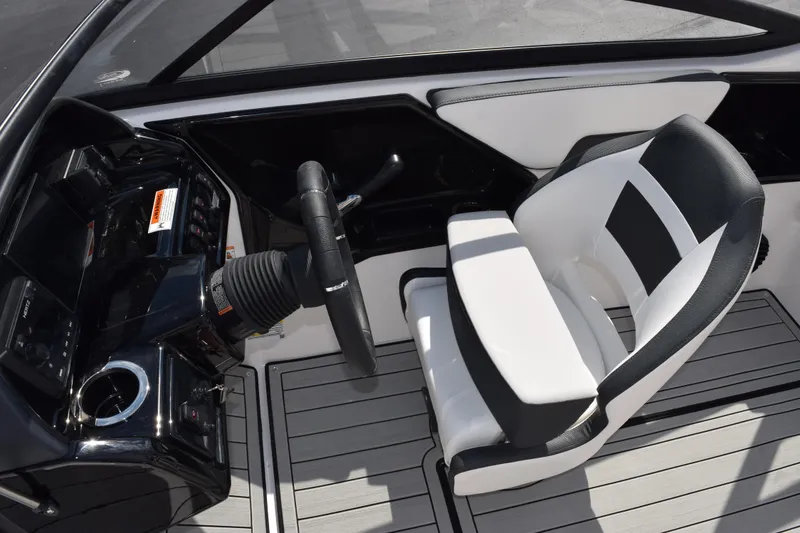 Slide: The Image of 2026 Yamaha Boats 195S cockpit with sleek steering and modern seating design. - 15