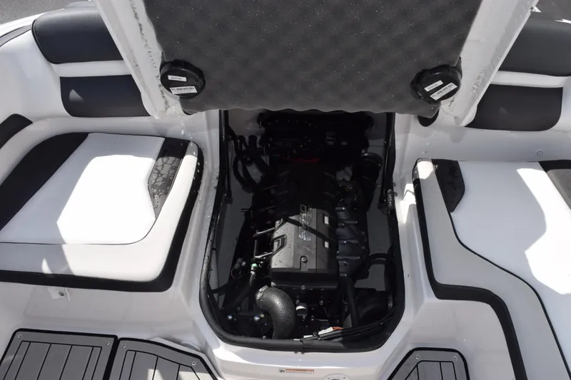 Slide: The Image of 2026 Yamaha Boats 195S engine compartment with open hatch, showcasing interior components. - 21