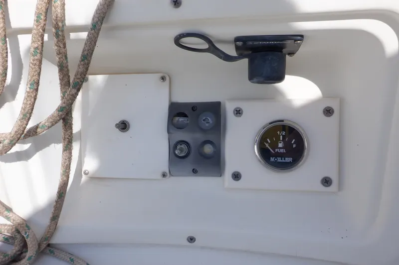 Slide: The Image of Control panel of a 2002 Seaward Eagle 32 RK sailboat with fuel gauge and ropes. - 18