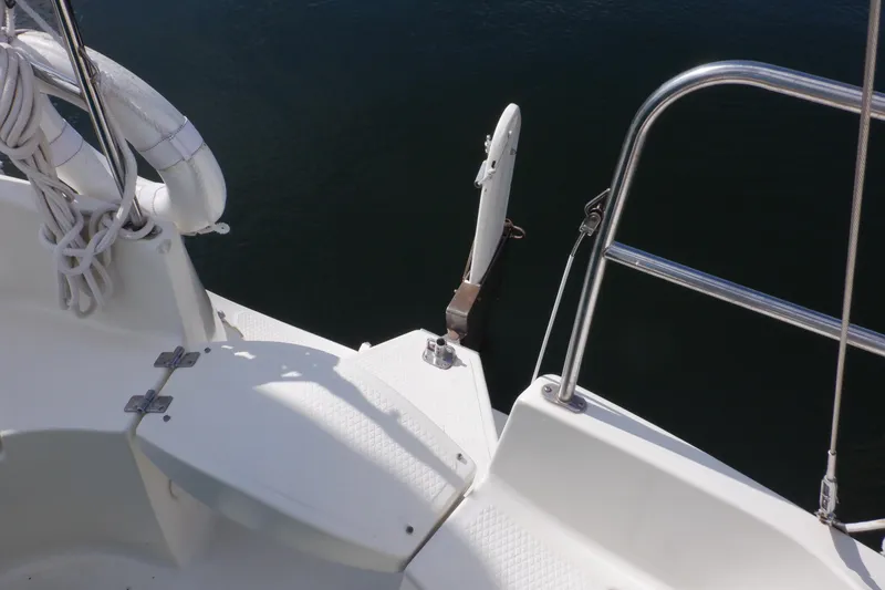 Slide: The Image of 2002 Seaward Eagle 32 RK sailboat deck with railing and lifebuoy. - 20