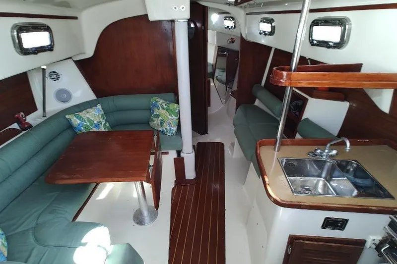 Slide: The Image of Interior of 2002 Seaward Eagle 32 RK sailboat with cozy seating and kitchenette. - 21