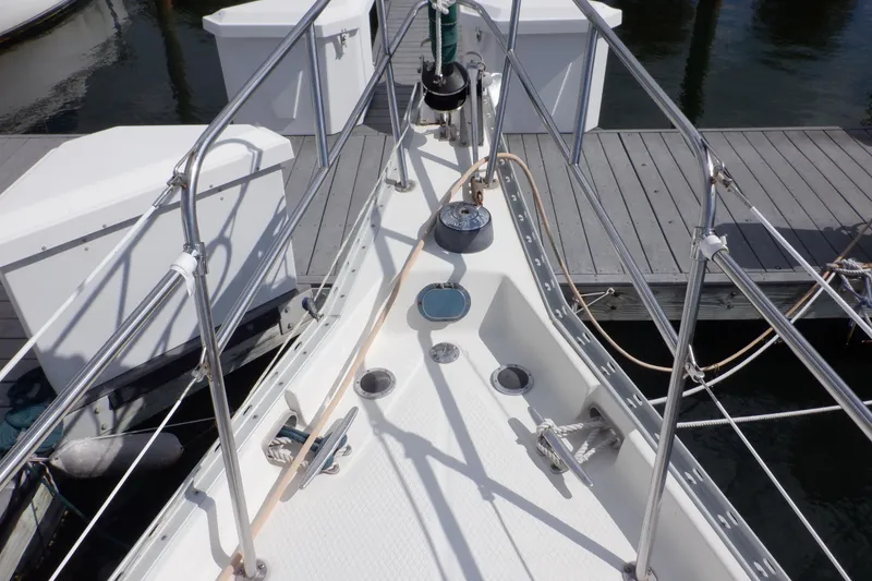 Slide: The Image of Bow of 2002 Seaward Eagle 32 RK sailboat docked at marina. - 3