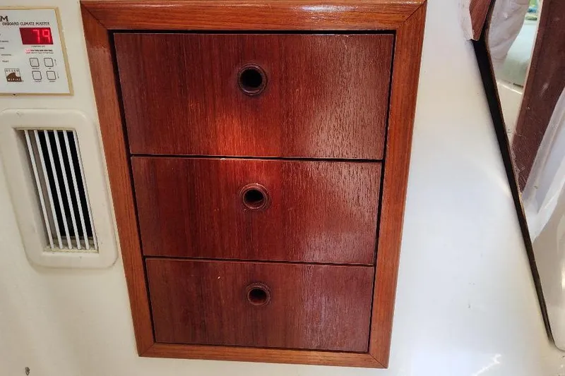 Slide: The Image of Wooden drawers on a 2002 Seaward Eagle 32 RK boat interior. - 41