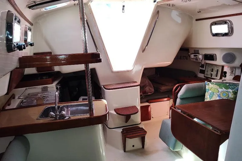 Slide: The Image of Interior of 2002 Seaward Eagle 32 RK sailboat with cozy seating and compact kitchen. - 43