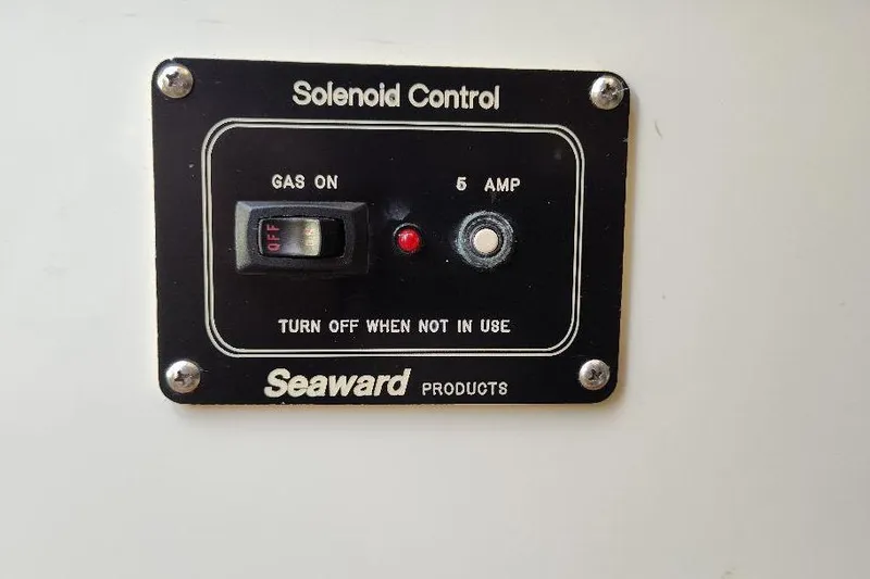 Slide: The Image of Seaward Eagle 32 RK 2002 solenoid control panel with gas switch and indicator lights. - 44