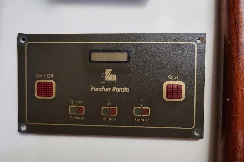 Slide: The Image of Fischer Panda control panel on 2002 Seaward Eagle 32 RK boat, featuring engine indicators. - 45