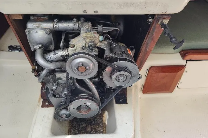 Slide: The Image of Engine compartment of a 2002 Seaward Eagle 32 RK sailboat, showcasing mechanical components. - 47