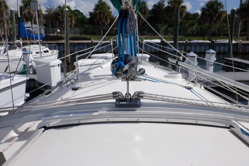 Slide: The Image of 2002 Seaward Eagle 32 RK sailboat deck with rigging and marina background. - 9