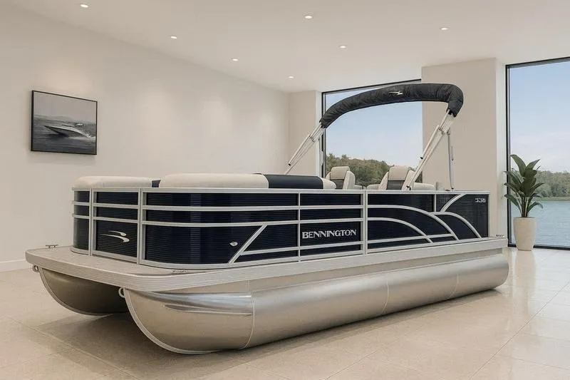 The Image of 2025 Bennington S Fish 22 SF pontoon boat displayed indoors with scenic window view. - 1