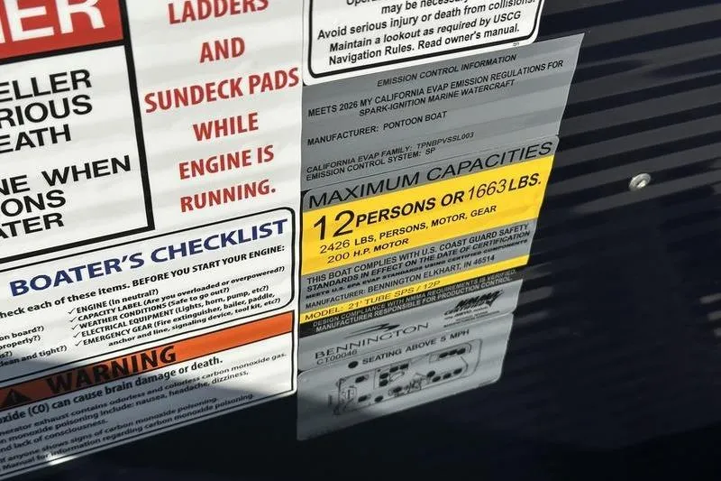 Slide: The Image of 2025 Bennington S Fish 22 SF capacity label, 12 persons or 1663 lbs, safety warnings. - 14