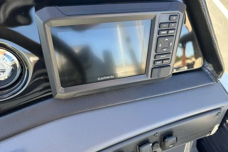 Slide: The Image of Garmin display on 2025 Bennington S Fish 22 SF boat dashboard. - 16