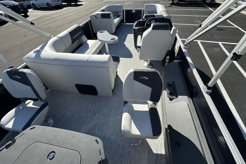 Slide: The Image of 2025 Bennington S Fish 22 SF pontoon boat interior with seating and helm. - 3