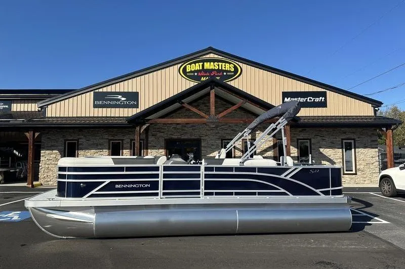 Slide: The Image of 2025 Bennington S Fish 22 SF pontoon boat outside Boat Masters dealership. - 6