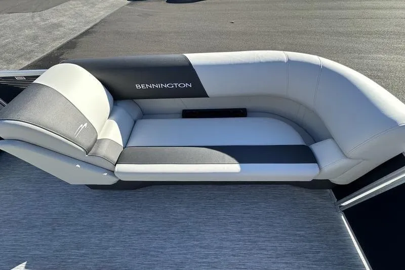 Slide: The Image of 2025 Bennington S Fish 22 SF boat seating, featuring sleek gray and white upholstery. - 8