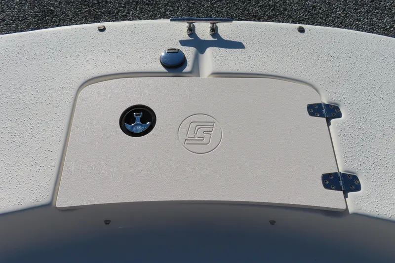 Slide: The Image of 2017 Carolina Skiff 238 DLV boat hatch with textured surface and logo. - 11