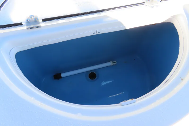 Slide: The Image of Open storage compartment in 2017 Carolina Skiff 238 DLV boat. - 24