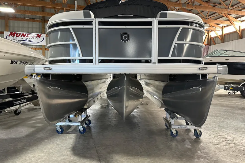 Slide: The Image of 2026 Godfrey SWEETWATER 2286 SFL pontoon boat in showroom, front view. - 3