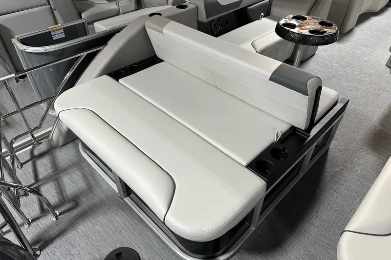 Slide: The Image of Luxurious seating area on 2026 Godfrey SWEETWATER 2286 SFL pontoon boat with cup holders. - 7