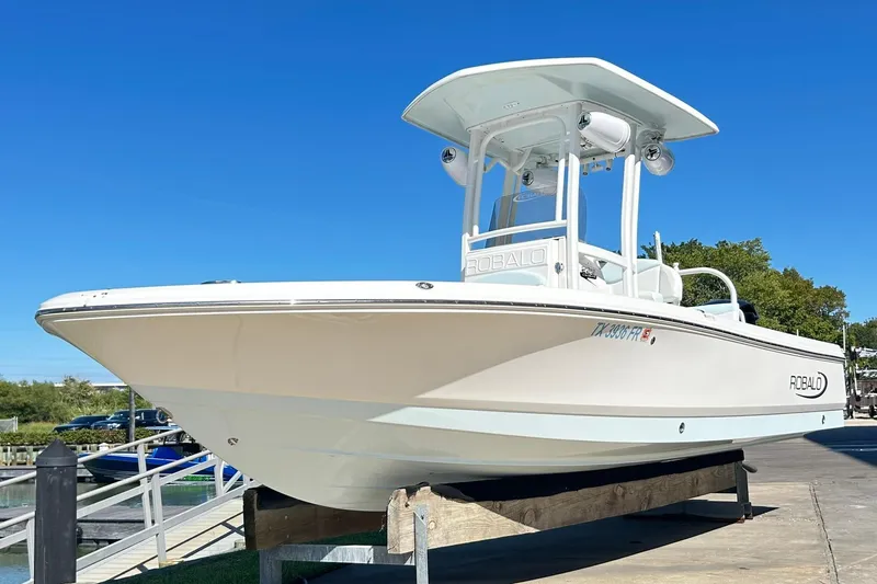 The Image of 2019 Robalo 226 Cayman boat on display under clear blue sky. - 0