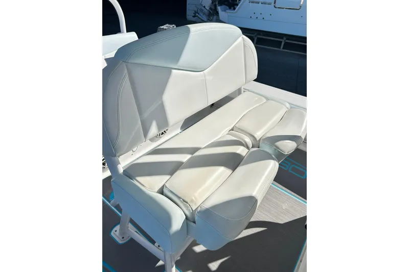 Slide: The Image of 2019 Robalo 226 Cayman boat seat, white upholstery, close-up view. - 48