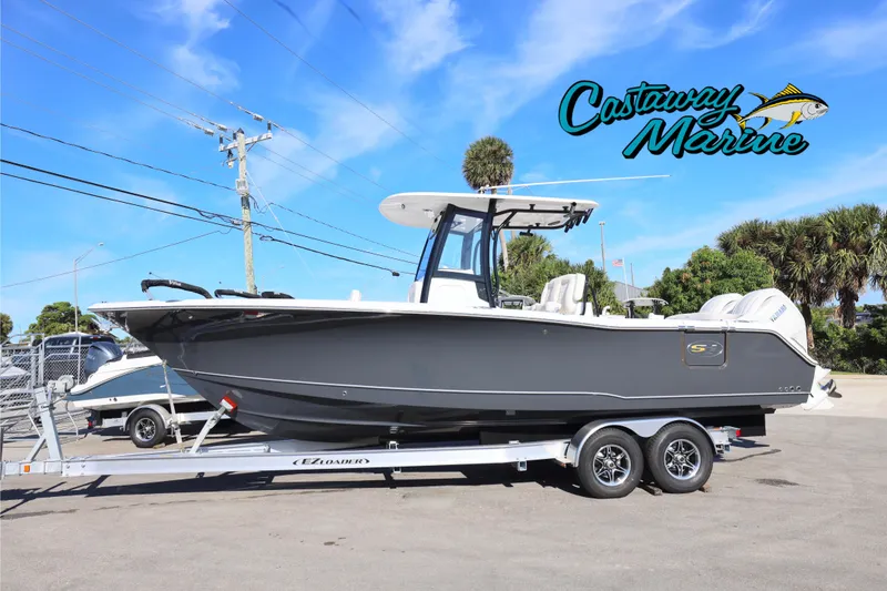 The Image of 2026 Sea Hunt Ultra 275 SE boat on trailer at Castaway Marine dealership. - 0