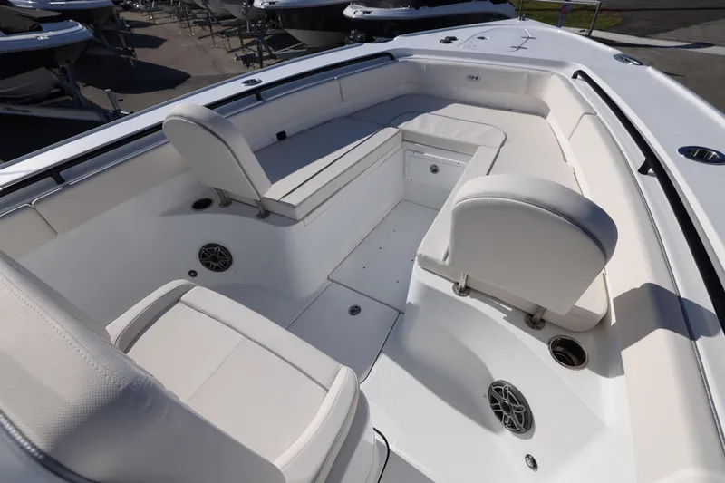 Slide: The Image of 2026 Sea Hunt Ultra 275 SE boat interior with white seating and modern design. - 10