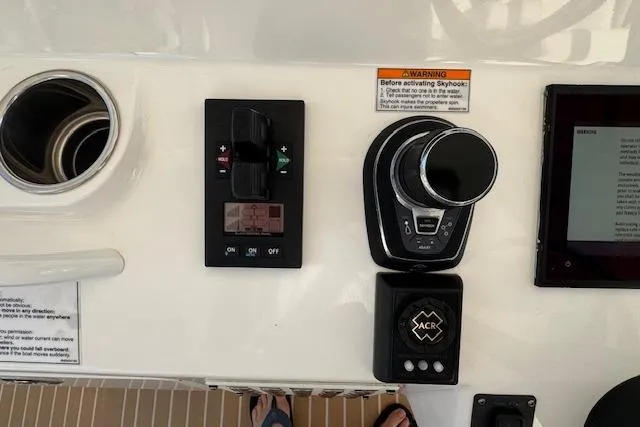 Slide: The Image of Control panel of a 2016 Intrepid 475 Panacea boat with navigation equipment. - 11