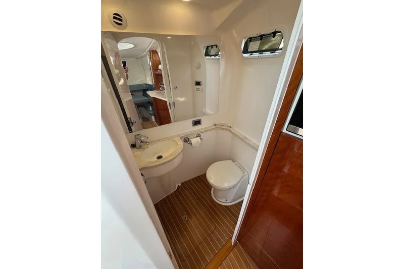 Slide: The Image of Luxurious bathroom interior of 2016 Intrepid 475 Panacea yacht with modern amenities. - 22