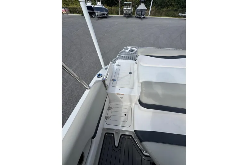 Slide: The Image of 2019 Starcraft Star Step 221 I/O boat interior with seating and storage compartments. - 15