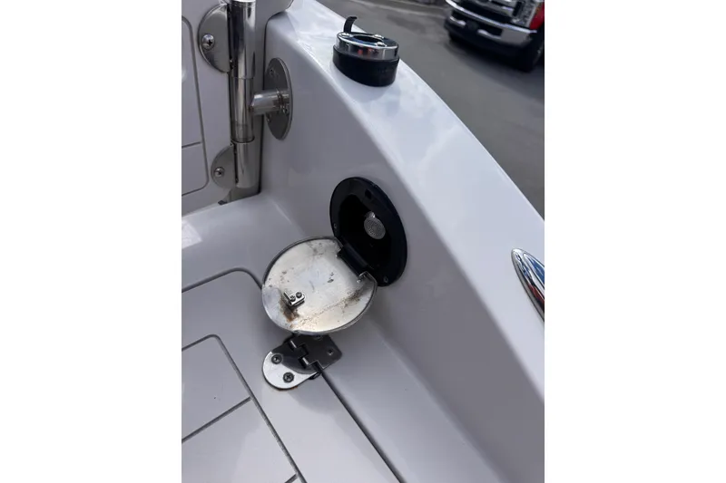 Slide: The Image of 2019 Starcraft Star Step 221 I/O boat fuel cap and hinge detail. - 20