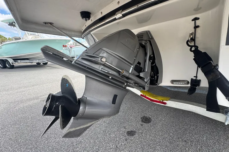 Slide: The Image of 2019 Starcraft Star Step 221 I/O boat with visible outboard motor and propeller. - 7