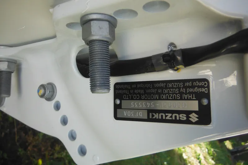 Slide: The Image of Close-up of Suzuki motor label on 1973 Boston Whaler 13 Sport Side boat. - 12