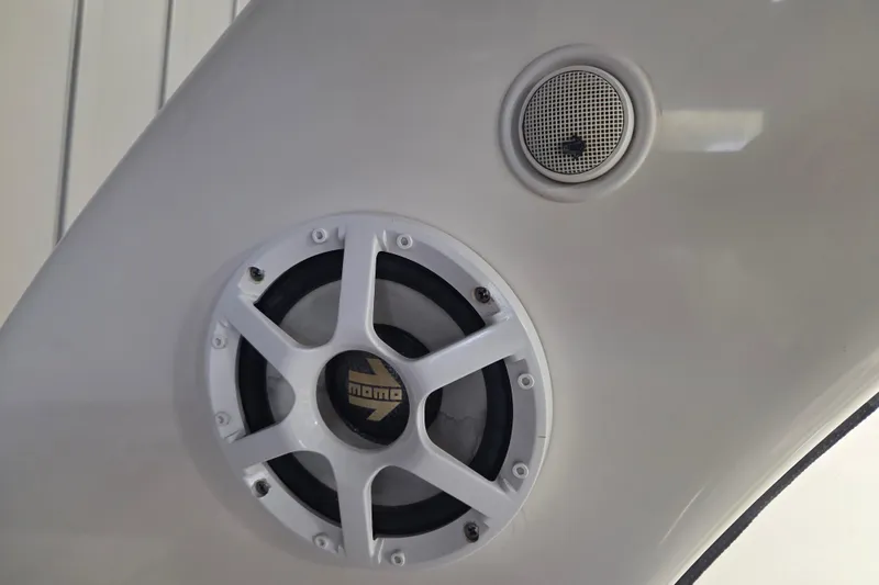 Slide: The Image of Close-up of speakers on a 2006 Sea Ray 300 Sundancer boat. - 26