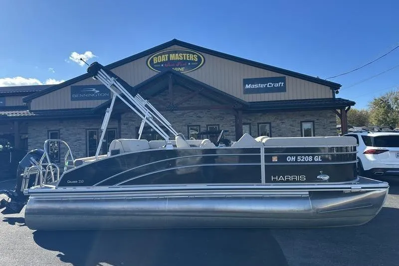 The Image of 2023 Harris Cruiser 210 CS pontoon boat parked at Boat Masters Marine dealership. - 1