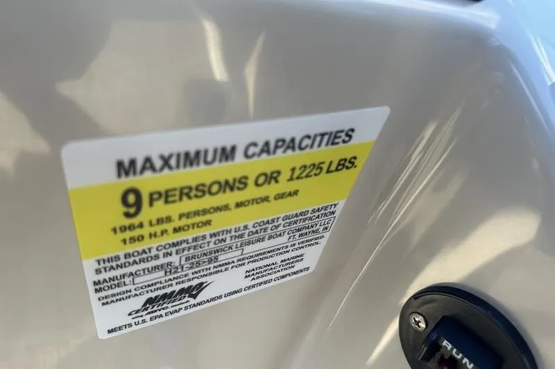 Slide: The Image of Capacity label on 2023 Harris Cruiser 210 CS, max 9 persons or 1225 lbs. - 10